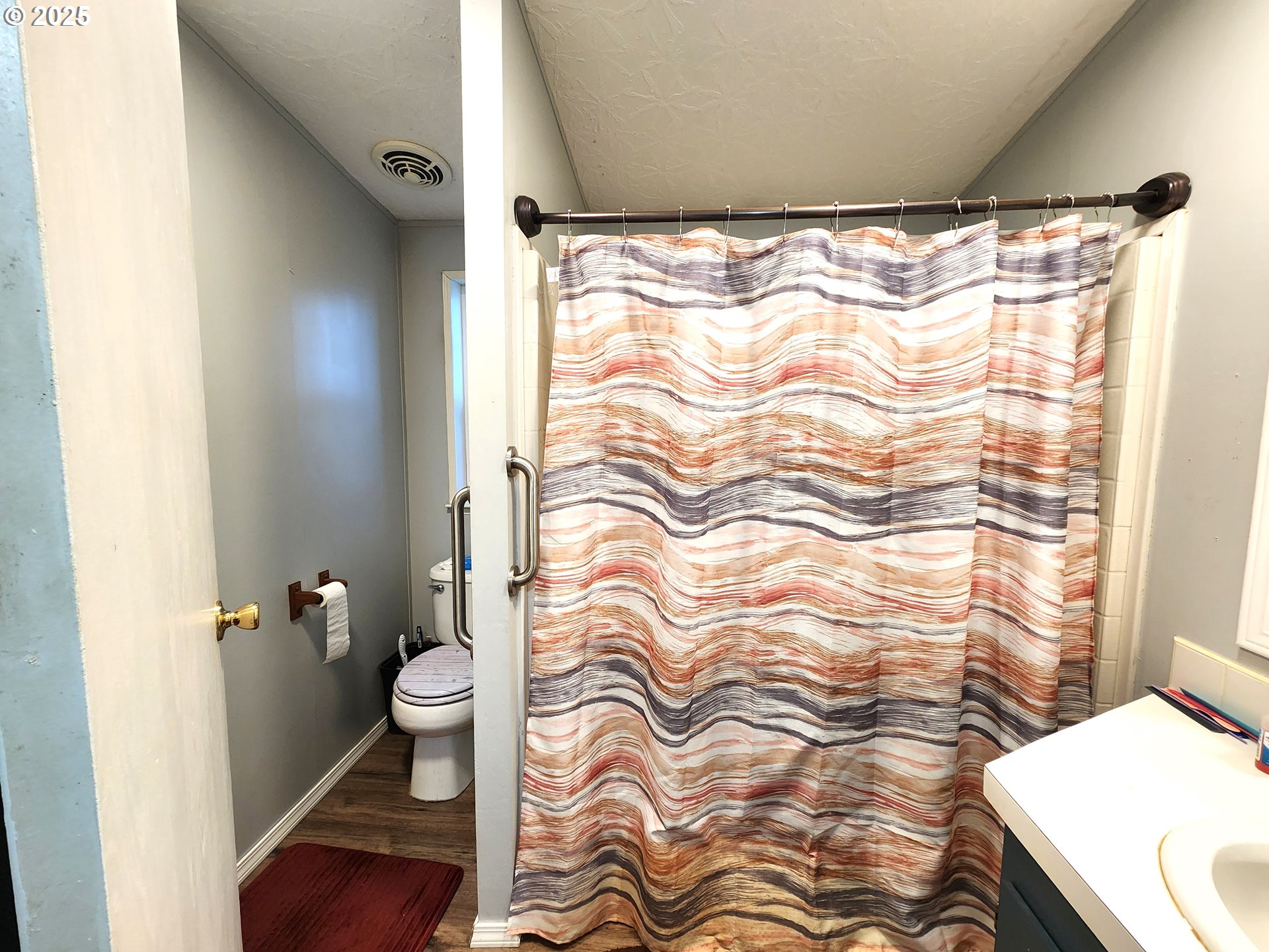 1601 Carolyn Terrace, Unit 9 Elgin, OR 97827 - Photo 7 of 7 a bathroom with a sink and toilet
