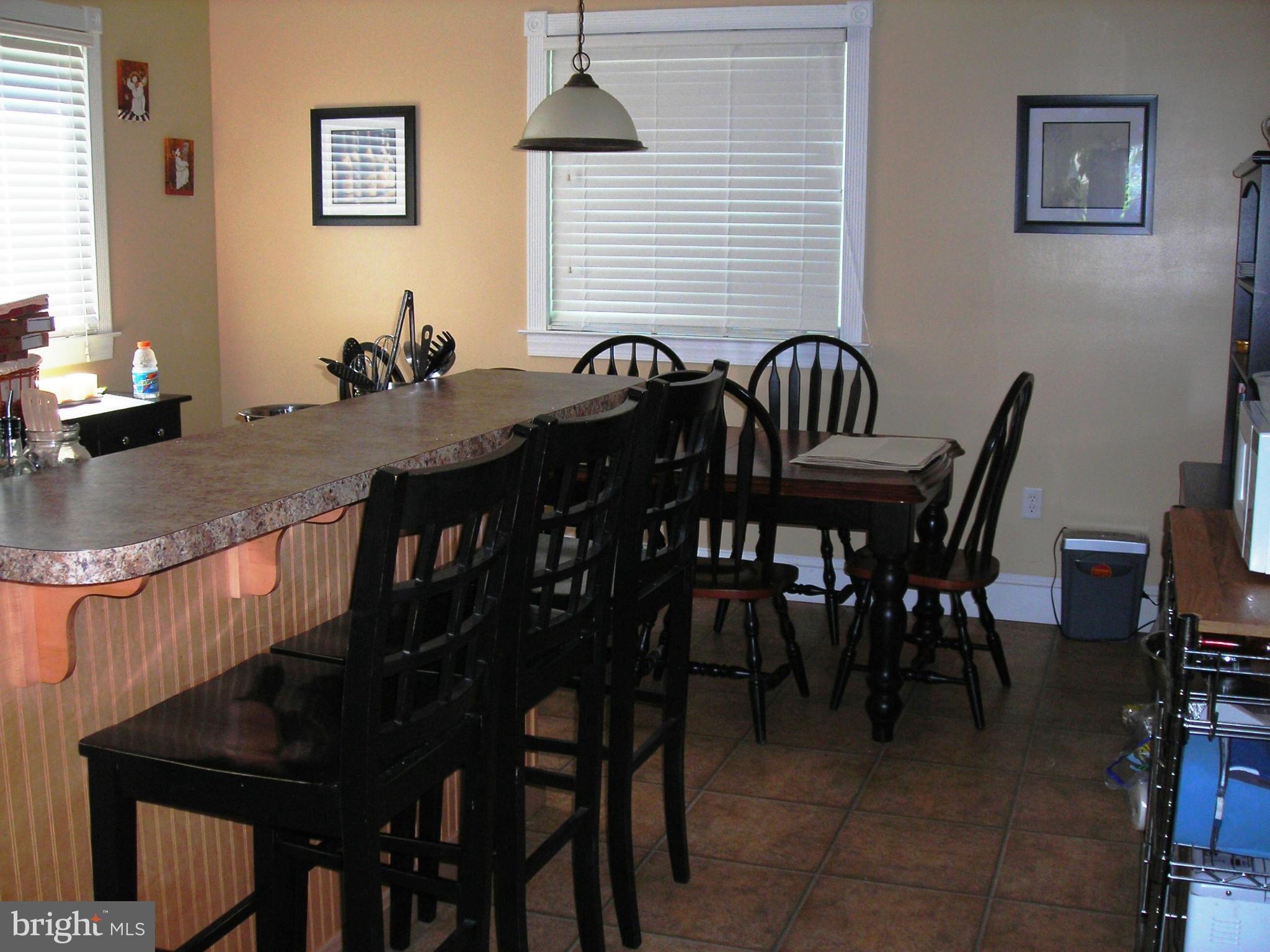 501 South Mildred Street Ranson, WV 25438 - Photo 13 of 29 a view of a dining room with furniture and window