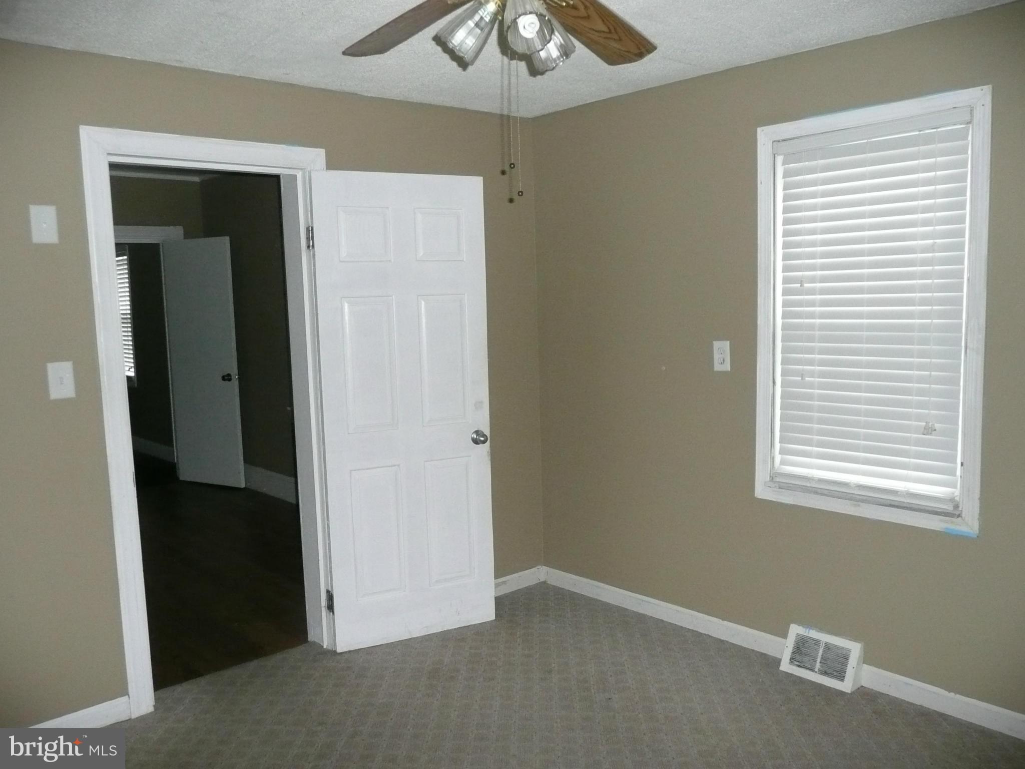 501 South Mildred Street Ranson, WV 25438 - Photo 15 of 29 an empty room that has a window