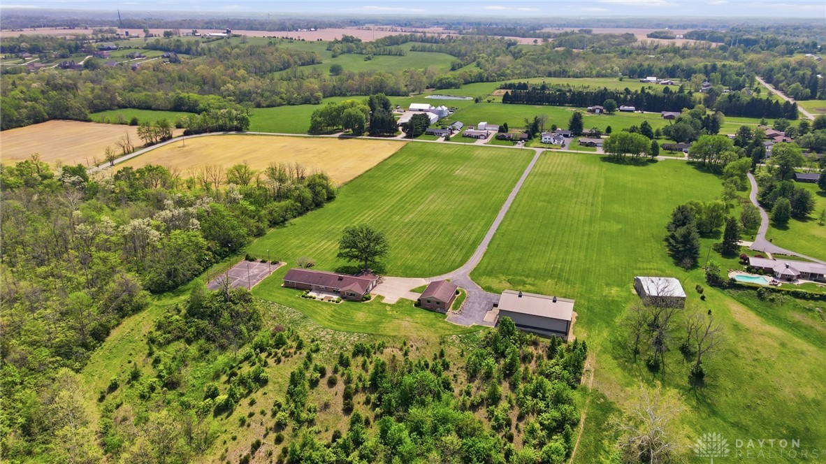 5669 O Neall Road Waynesville, OH 45068 - Photo 13 of 72 An aerial view captures the vast expanse of open fields and lush green surroundings.