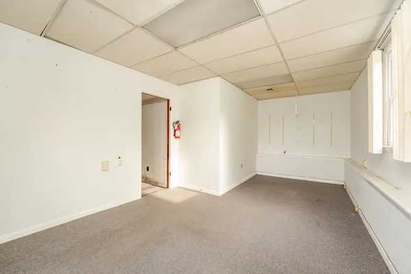 a view of a room with a hallway