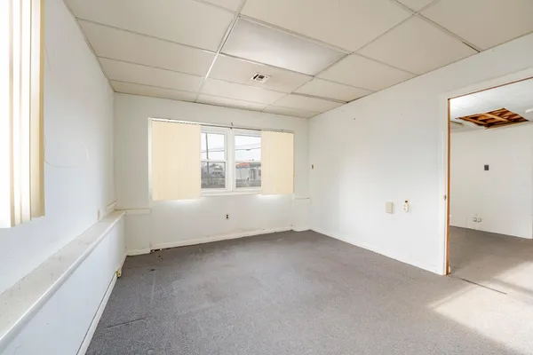 a view of a room with a window