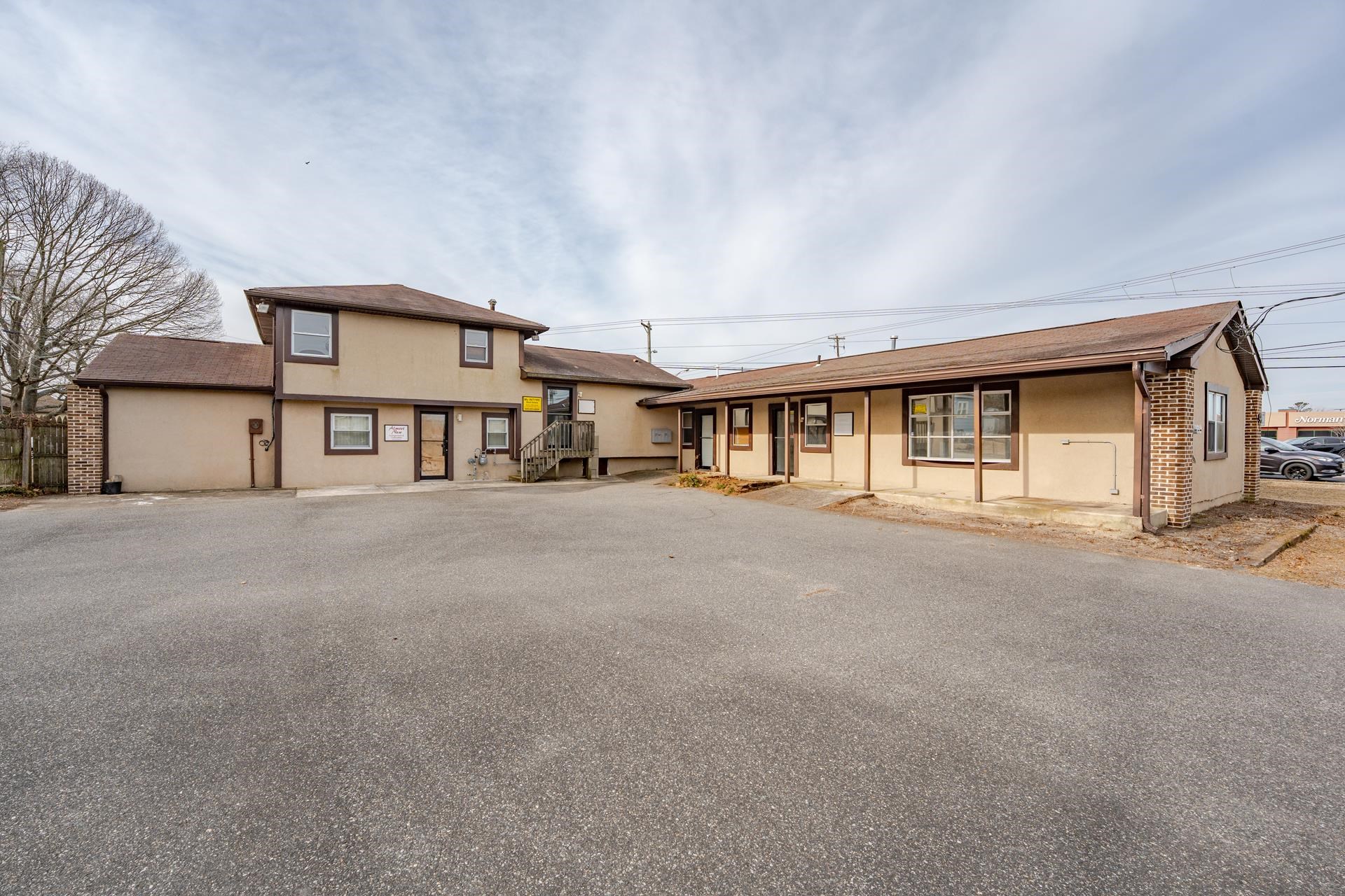 98 New Somers Point, NJ 08244 - Photo 2 of 49 a view of a house with large windows