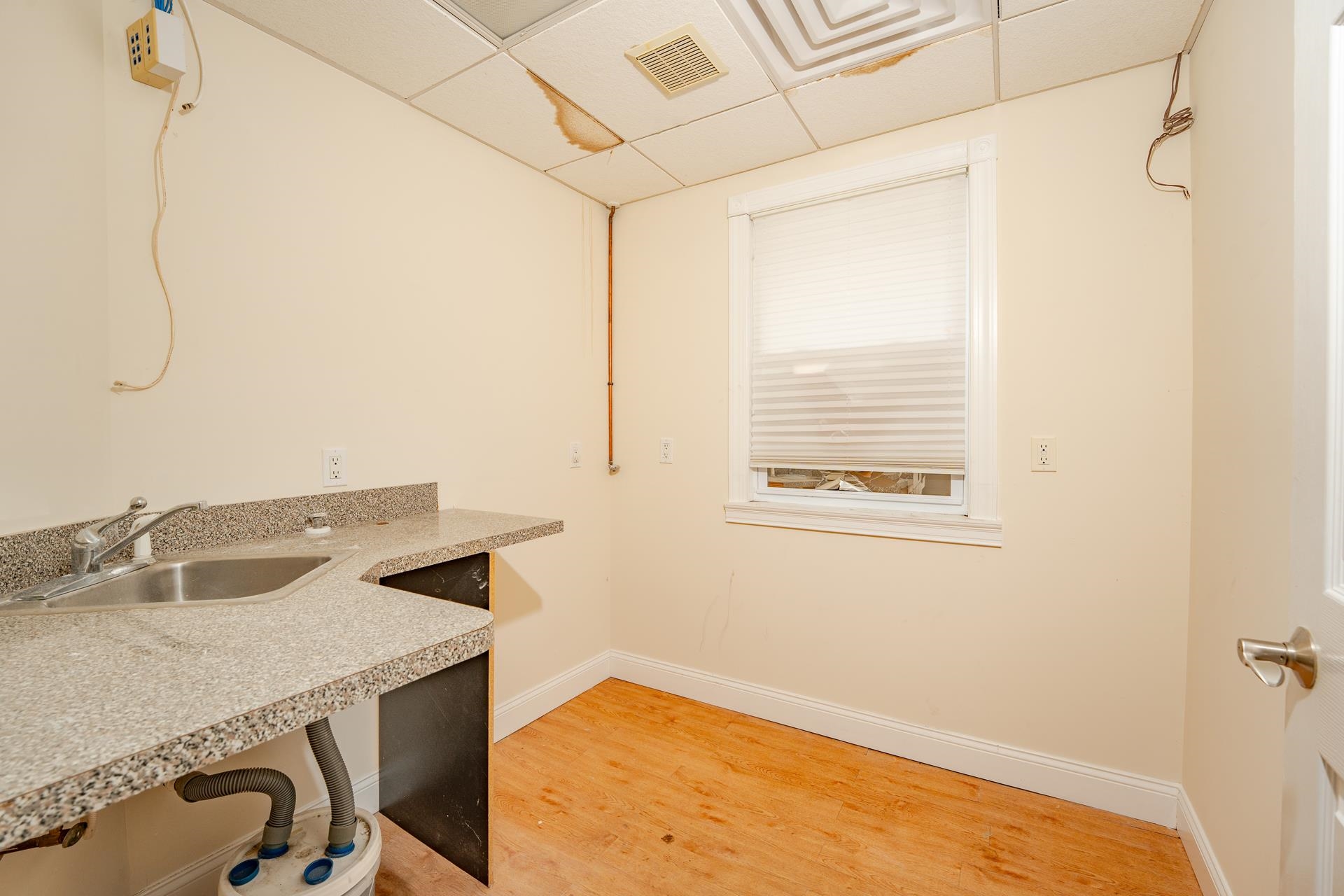 98 New Somers Point, NJ 08244 - Photo 26 of 49 a view of a kitchen that has a sink and a window in it