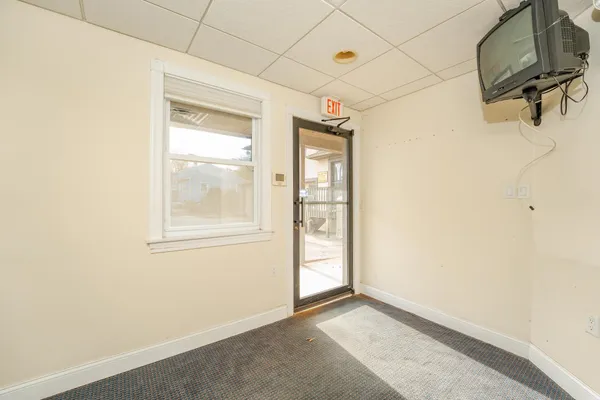 a view of a room with racks on the wall