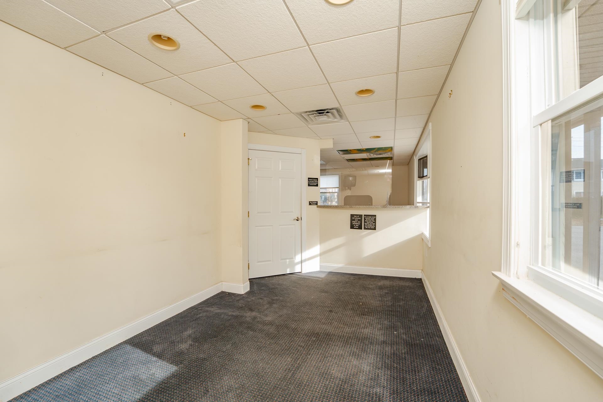 98 New Somers Point, NJ 08244 - Photo 30 of 49 a view of a hallway with a wooden shelves