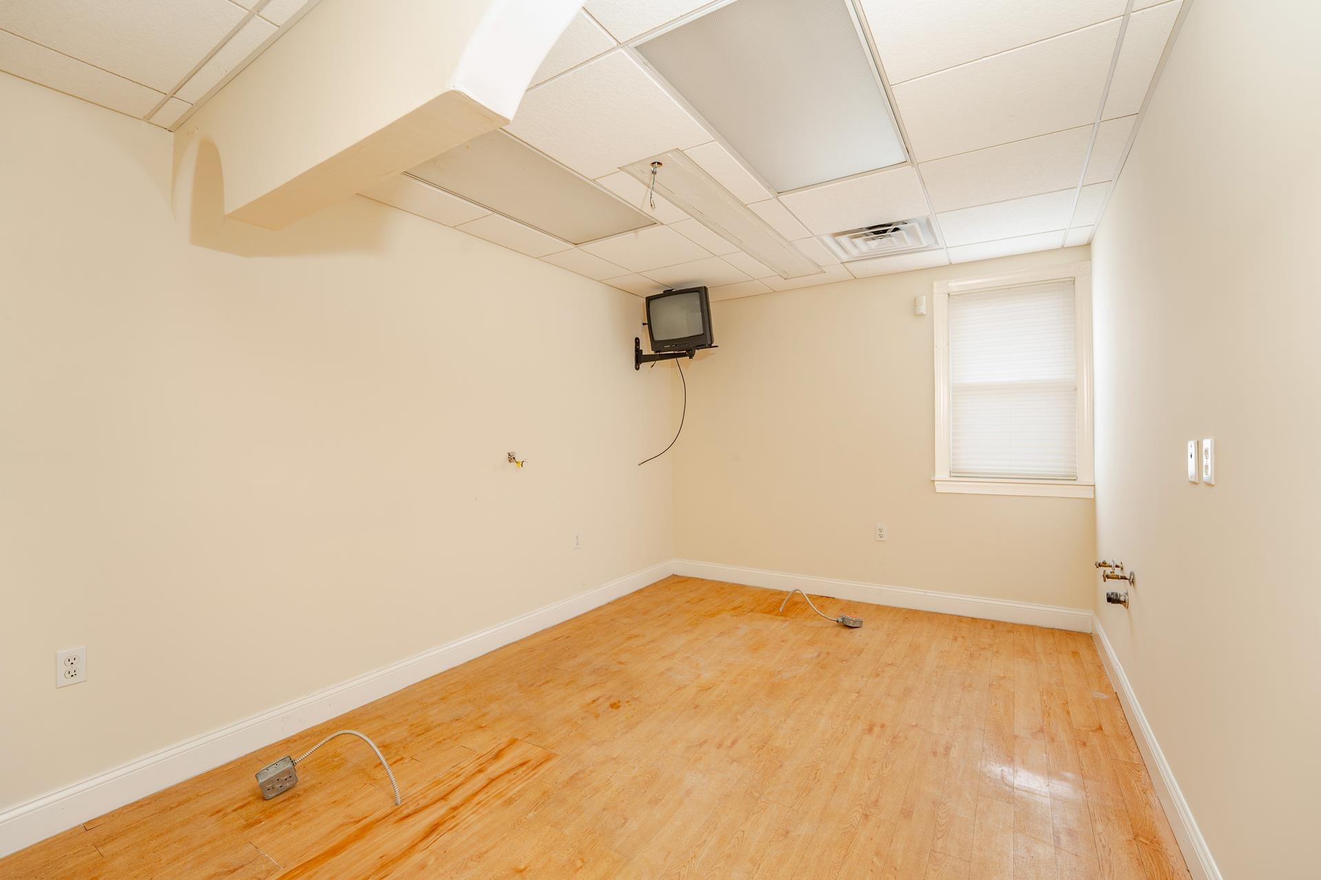 98 New Somers Point, NJ 08244 - Photo 33 of 49 a view of a room with racks on the wall