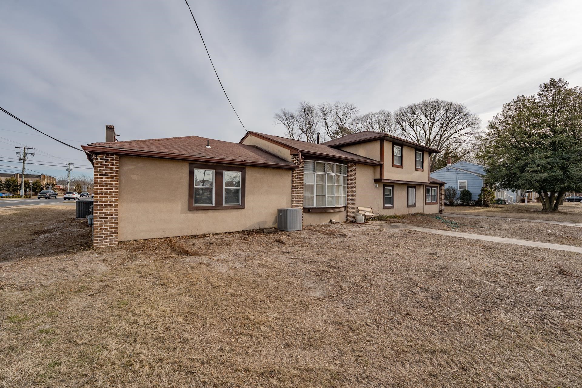 98 New Somers Point, NJ 08244 - Photo 43 of 49 a view of a house with a backyard