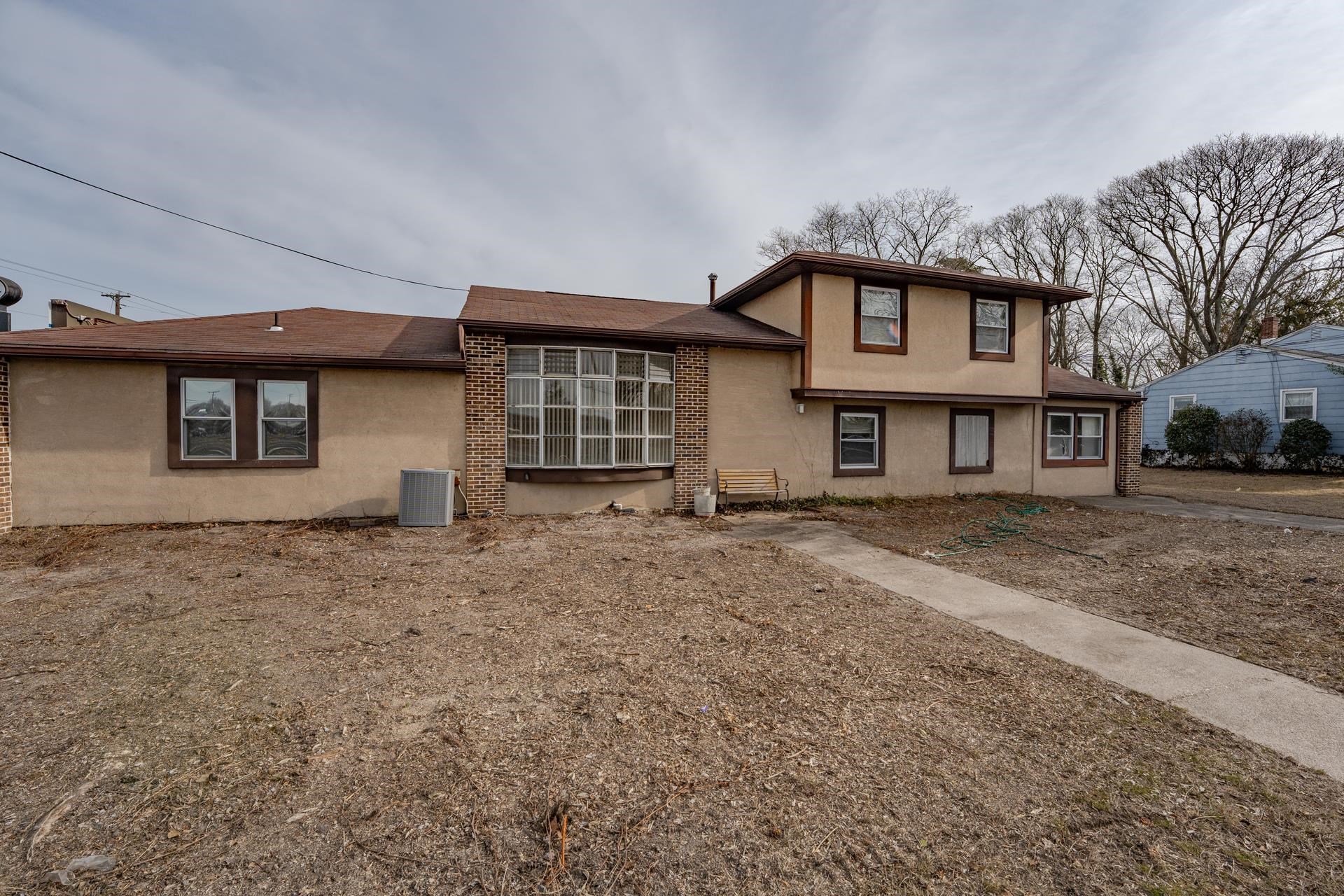 98 New Somers Point, NJ 08244 - Photo 44 of 49 a front view of a house with a yard