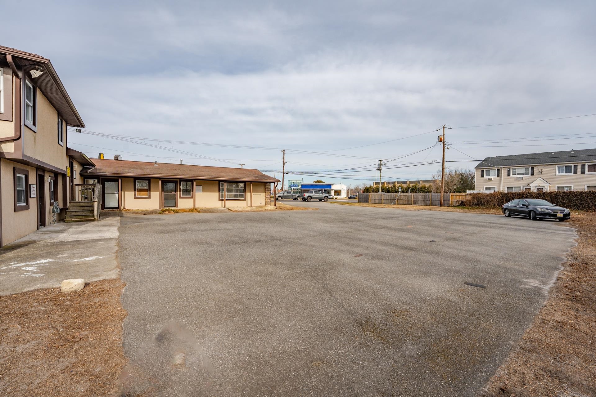 98 New Somers Point, NJ 08244 - Photo 5 of 49 a view of a street with cars