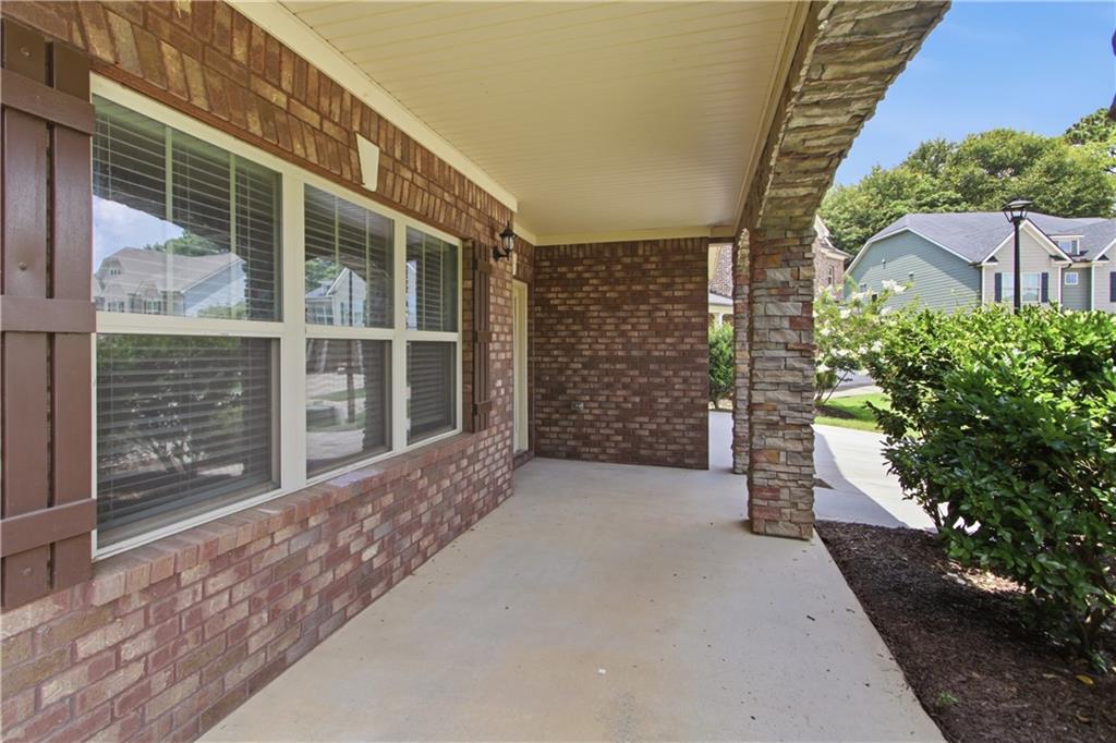 114 Madison Street Canton, GA 30115 - Photo 39 of 39 a view of front door of house and tree