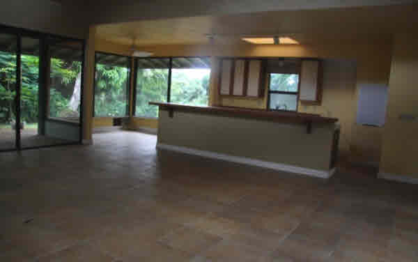 4332 Punee Road Koloa, HI 96756 - Photo 12 of 24 wooden floor in an empty room with a window