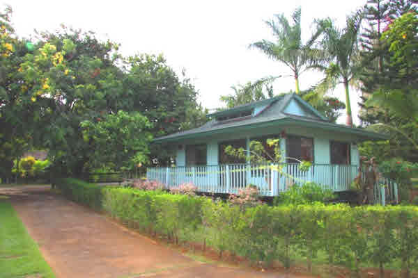 4332 Punee Road Koloa, HI 96756 - Photo 4 of 24 a front view of a house with a yard