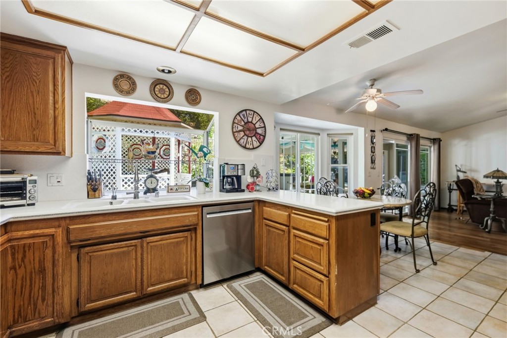 18233 Charlton Lane Porter Ranch, CA 91326 - Photo 34 of 40 a open kitchen with a sink and cabinets