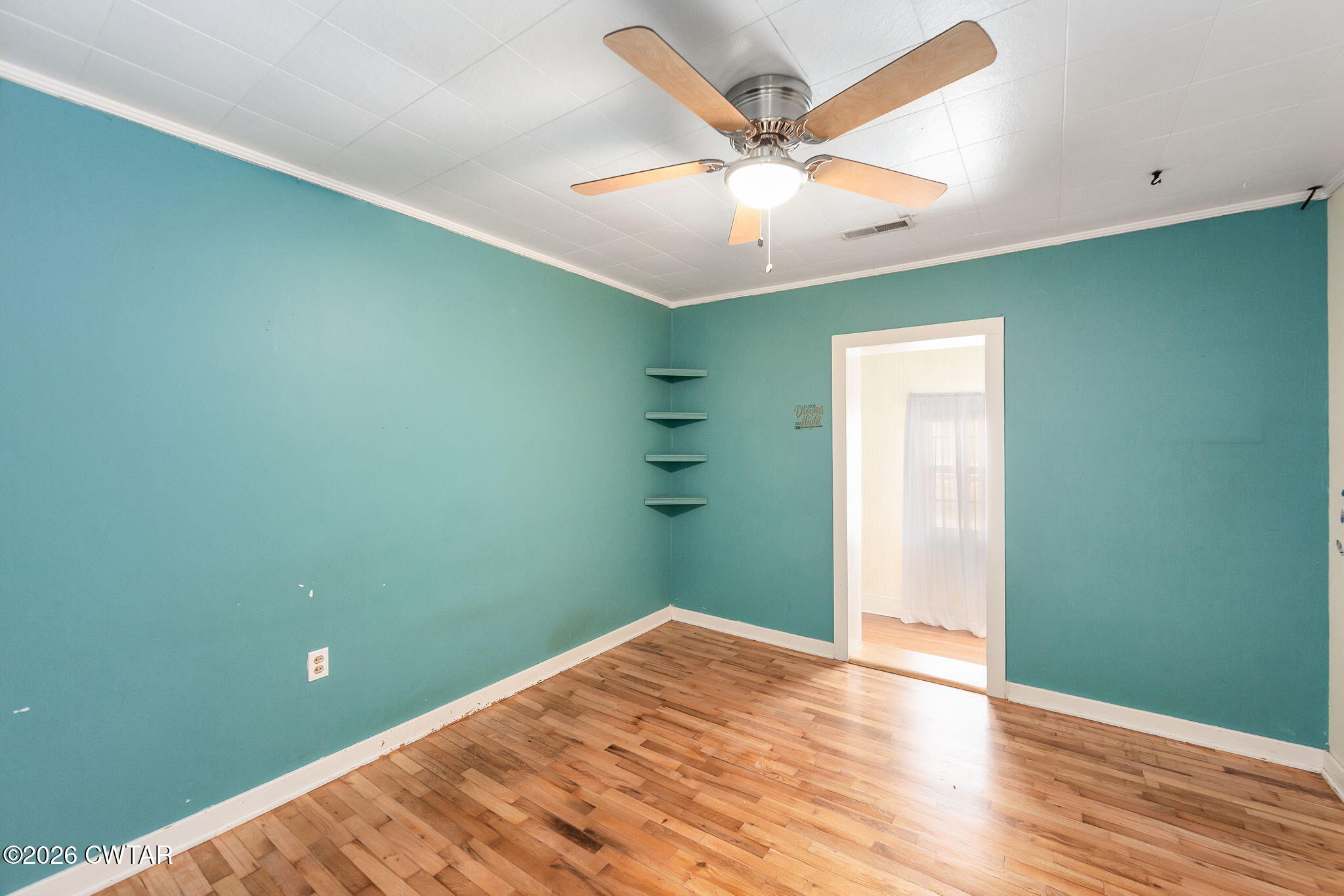 3875 Terry Road Huntingdon, TN 38344 - Photo 26 of 43 a view of empty room with wooden floor