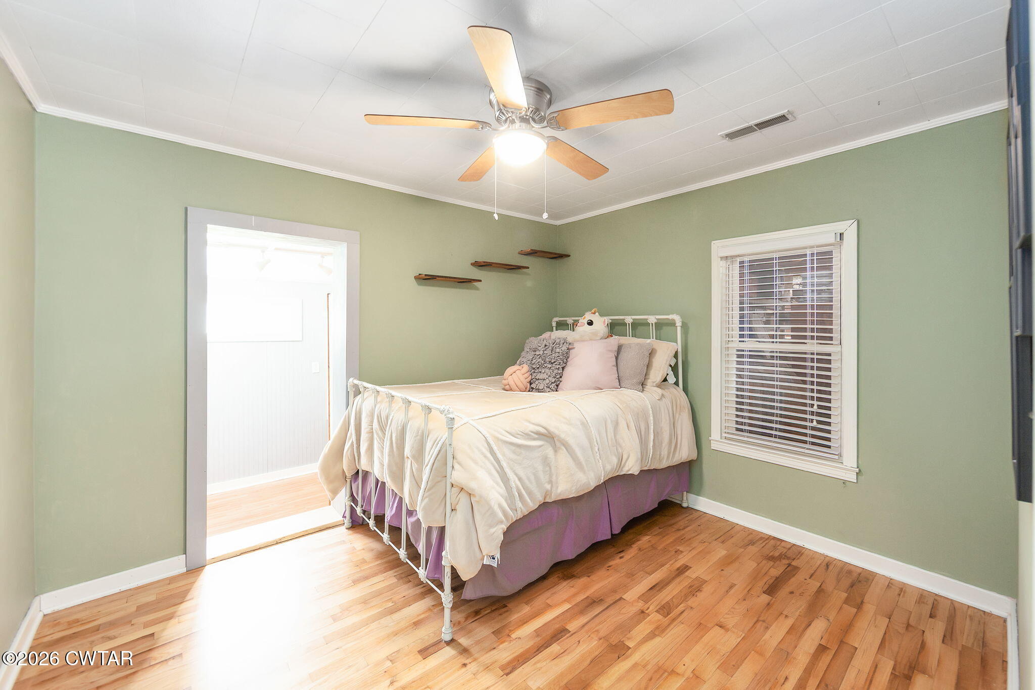 3875 Terry Road Huntingdon, TN 38344 - Photo 28 of 43 a bedroom with a bed and window