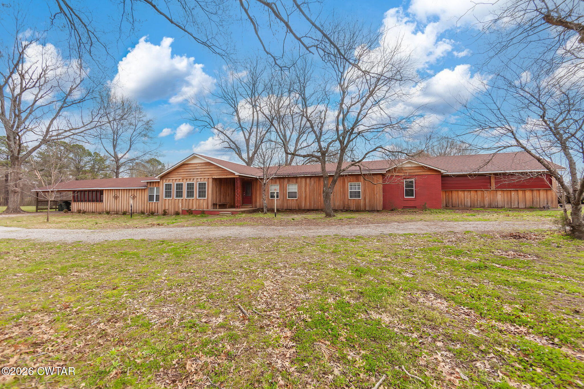 3875 Terry Road Huntingdon, TN 38344 - Photo 3 of 43 a front view of house with yard and ocean view