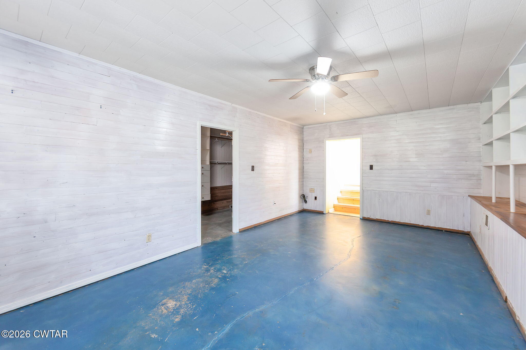 3875 Terry Road Huntingdon, TN 38344 - Photo 32 of 43 an empty room with a empty space and a ceiling fan