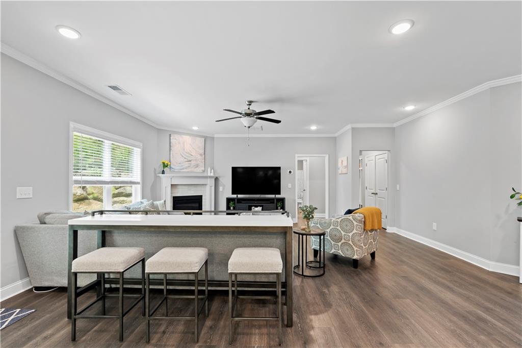 540 Glen Abbey Circle Mableton, GA 30126 - Photo 12 of 47 a view of a dining room with furniture and wooden floor