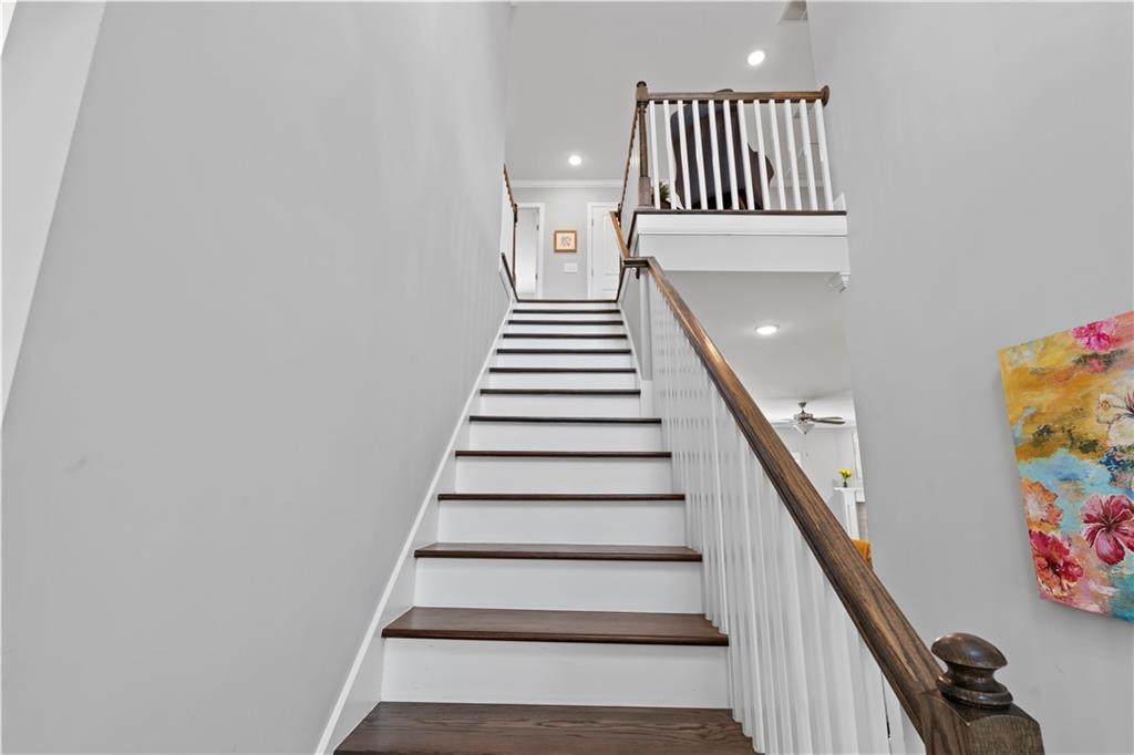 540 Glen Abbey Circle Mableton, GA 30126 - Photo 26 of 47 a view of entryway with wooden floor and stairs