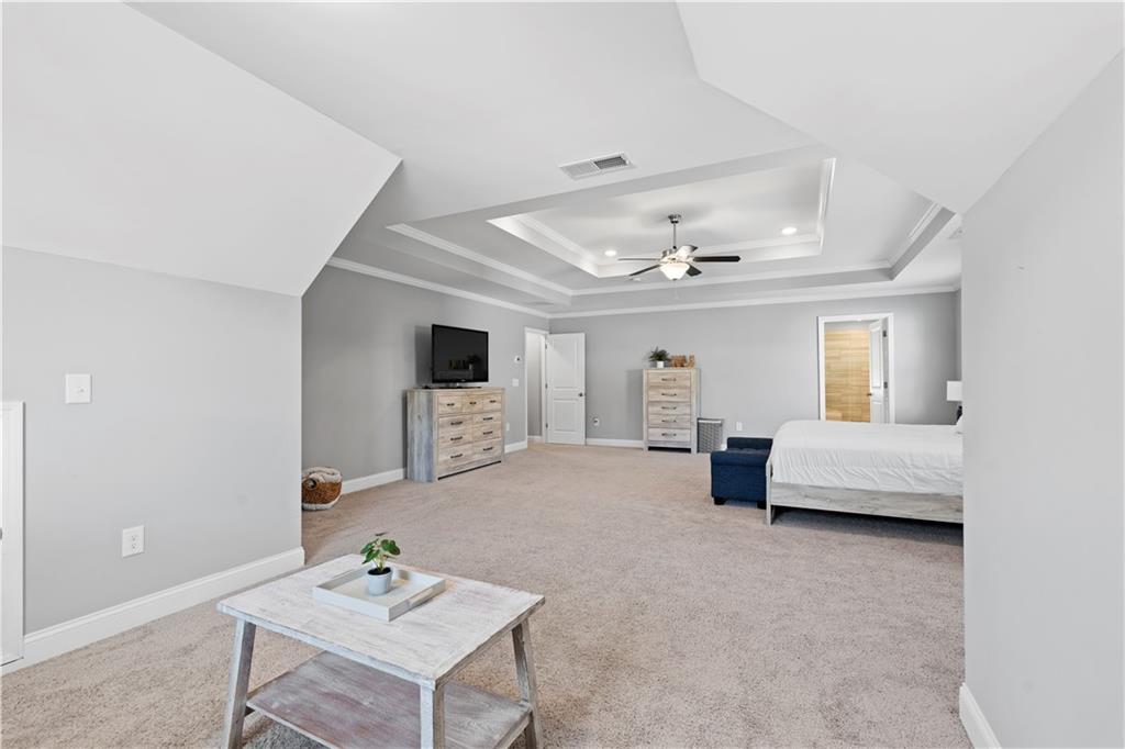 540 Glen Abbey Circle Mableton, GA 30126 - Photo 30 of 47 a living room with furniture and a flat screen tv