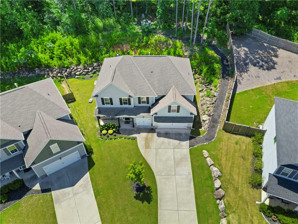 540 Glen Abbey Circle Mableton, GA 30126 - Photo 41 of 47 an aerial view of a house with swimming pool and large trees