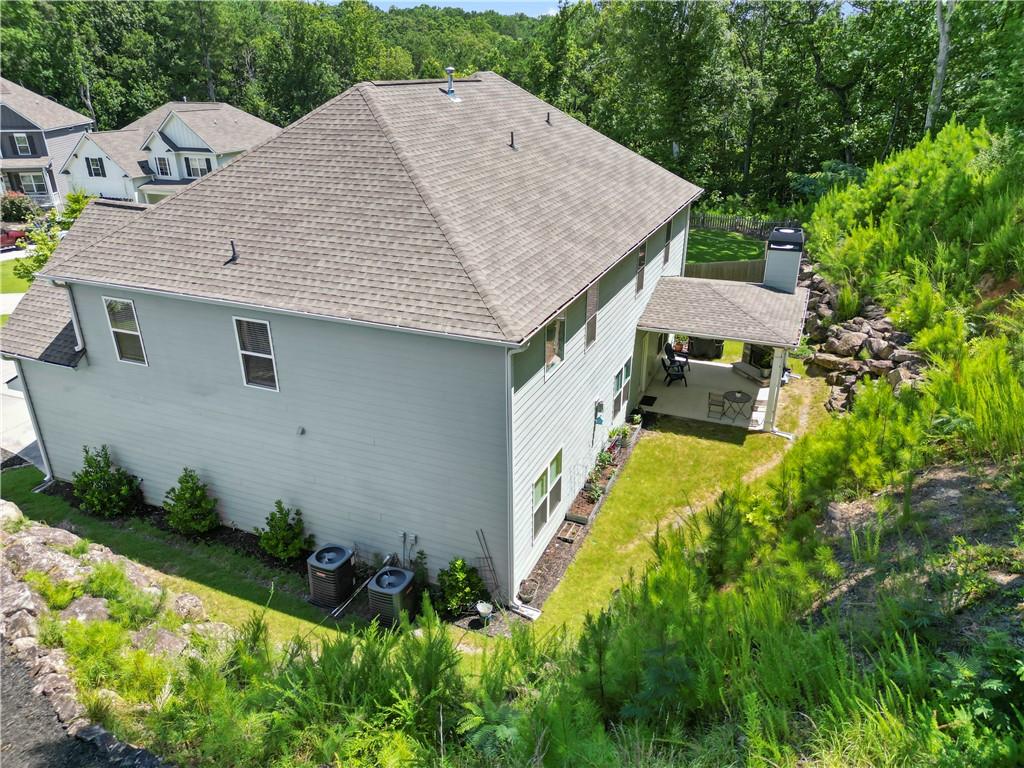 540 Glen Abbey Circle Mableton, GA 30126 - Photo 44 of 47 an aerial view of a house with swimming pool and garden