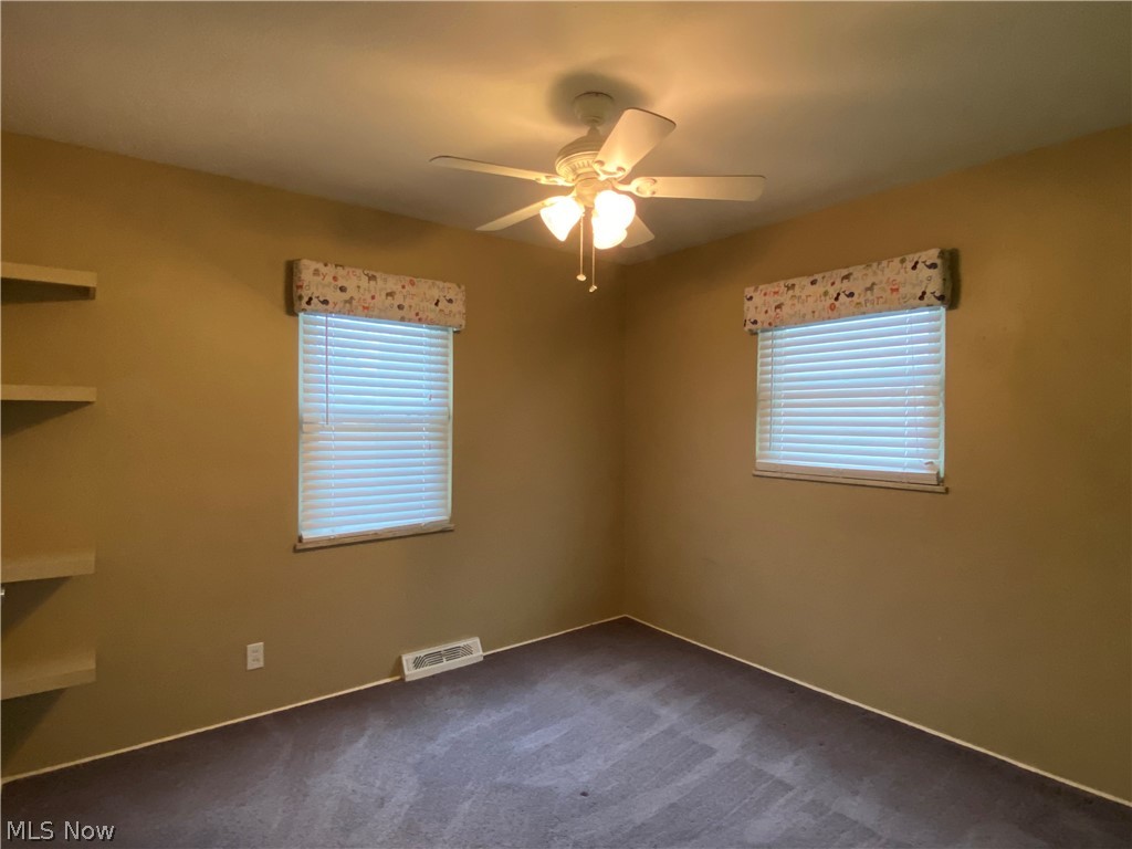 1589 Overbrook Road Lyndhurst, OH 44124 - Photo 19 of 32 Bedroom #2 feature cute built in shelves and a closet.