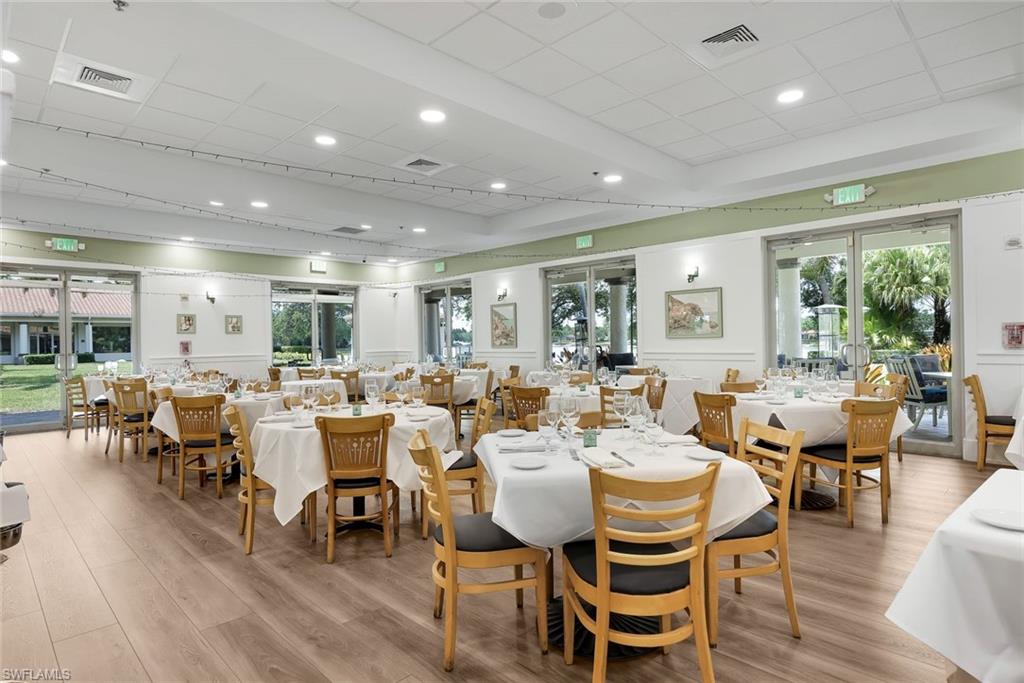 3108 Dominica Way Naples, FL 34119 - Photo 39 of 39 Onsite restaurant including a bar and al fresco seating.