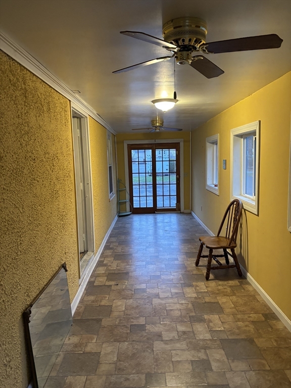 10 Cottage Street Belchertown, MA 01007 - Photo 11 of 40 a furnished livingroom with a chair and wooden floor
