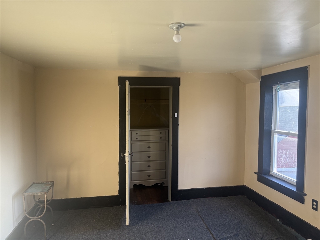 10 Cottage Street Belchertown, MA 01007 - Photo 16 of 40 a view of an empty room and window