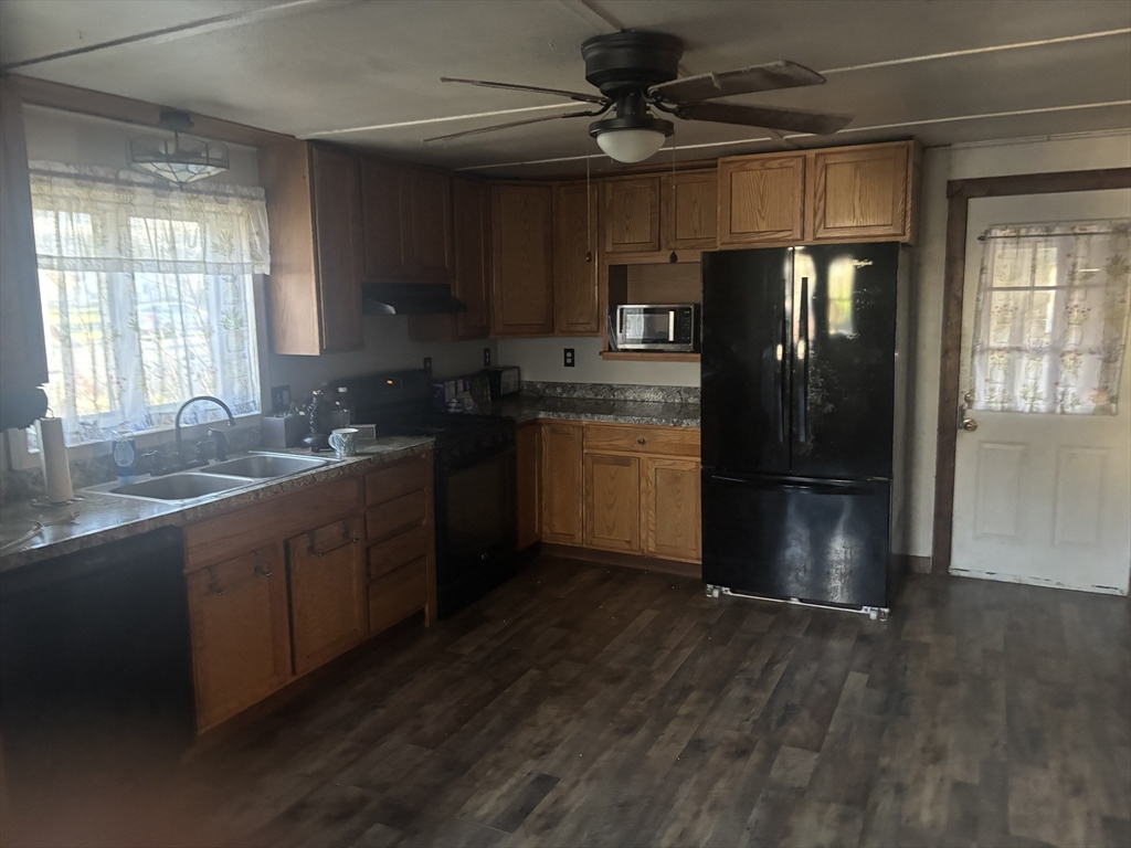 10 Cottage Street Belchertown, MA 01007 - Photo 20 of 40 a kitchen with stainless steel appliances granite countertop a refrigerator a sink and dishwasher