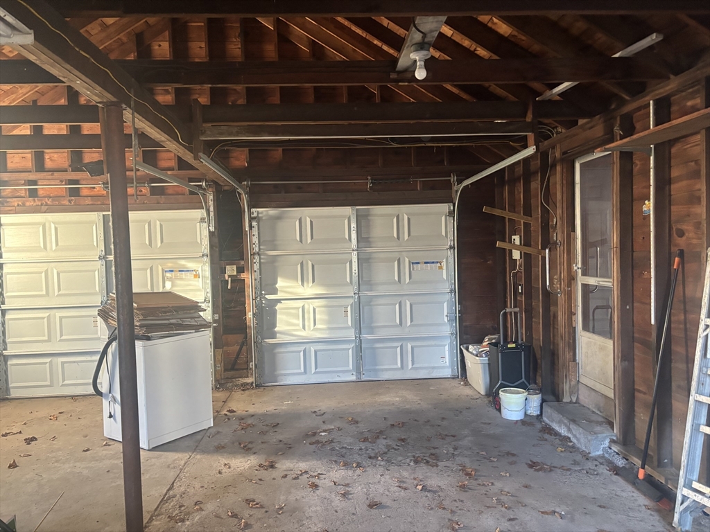 10 Cottage Street Belchertown, MA 01007 - Photo 21 of 40 a view of empty room with wooden floor and windows