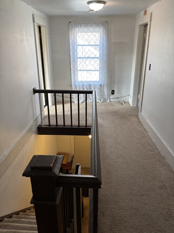 10 Cottage Street Belchertown, MA 01007 - Photo 39 of 40 a view of a balcony with furniture and window