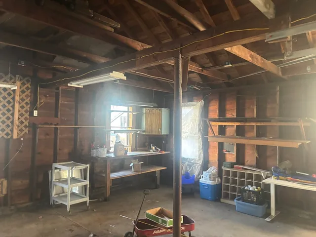 a room with furniture and a chandelier