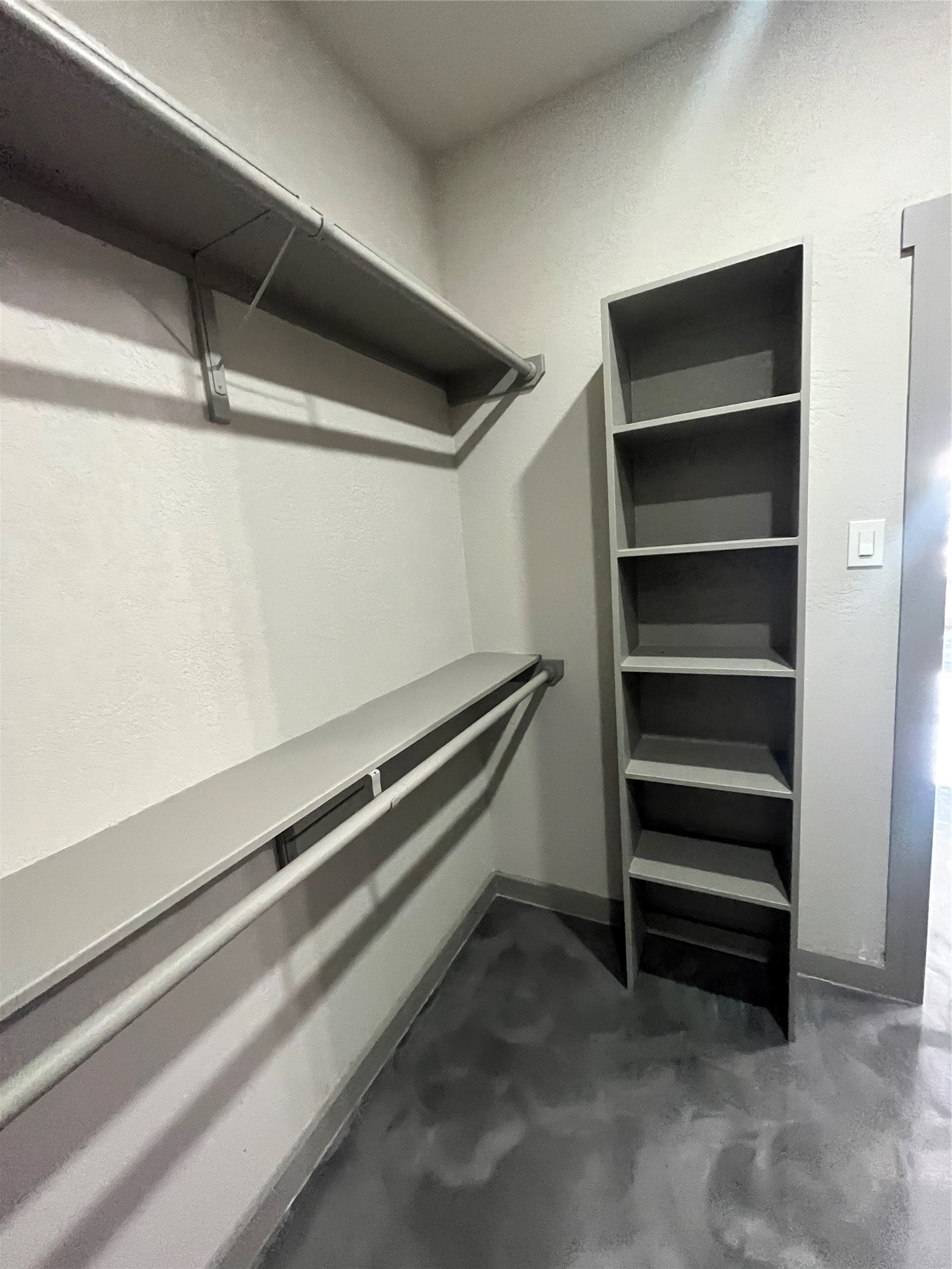 17539 Reno Road Conroe, TX 77306 - Photo 17 of 19 a view of an empty walk in closet