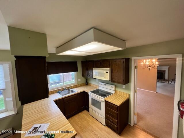 40 Red Hill Road Manchester Township, NJ 08759 - Photo 11 of 33 a kitchen with a stove and a refrigerator