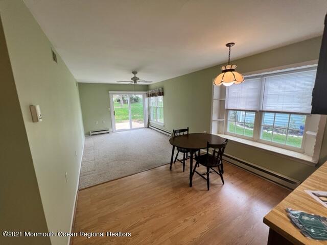 40 Red Hill Road Manchester Township, NJ 08759 - Photo 13 of 33 a view of a livingroom with furniture window and wooden floor