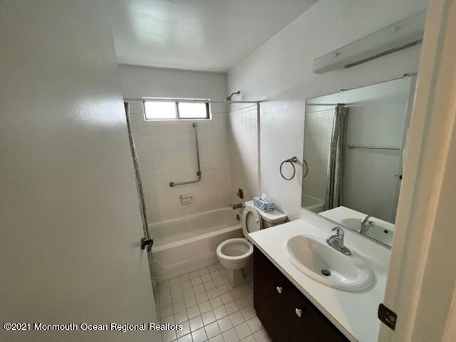40 Red Hill Road Manchester Township, NJ 08759 - Photo 19 of 33 a bathroom with a sink a toilet and shower