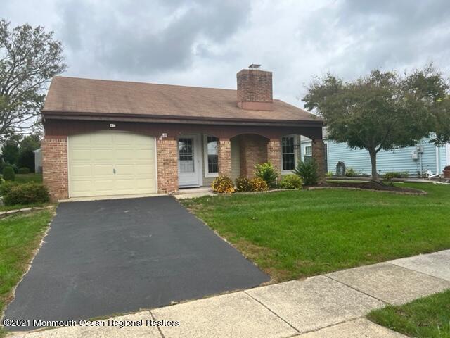40 Red Hill Road Manchester Township, NJ 08759 - Photo 2 of 33 a front view of a house with garden