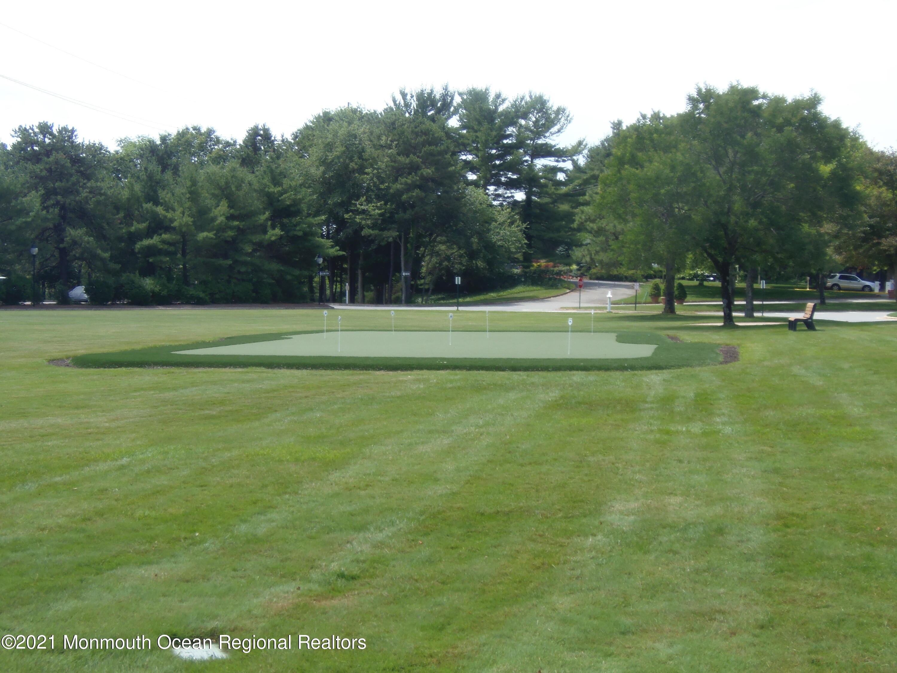 40 Red Hill Road Manchester Township, NJ 08759 - Photo 29 of 33 a view of a golf course with a lake
