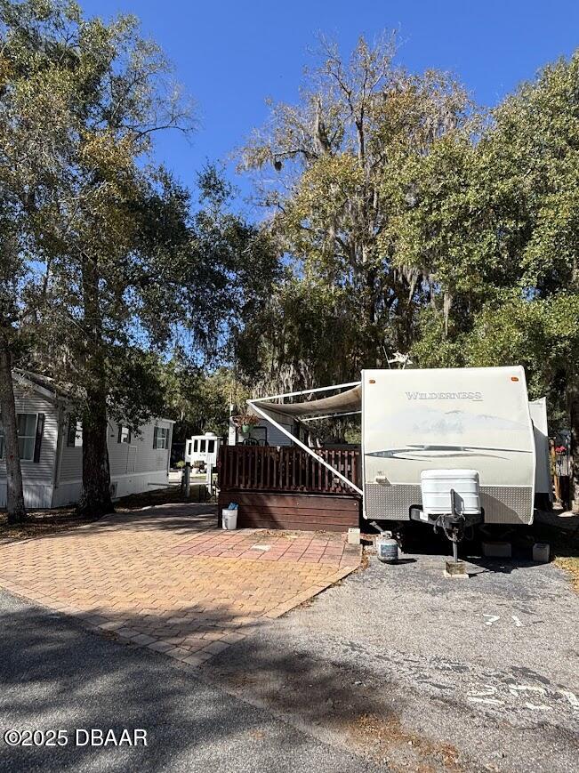 25146 Northeast 140th Loop Salt Springs, FL 32134 - Photo 3 of 46 a view of outdoor space with seating area