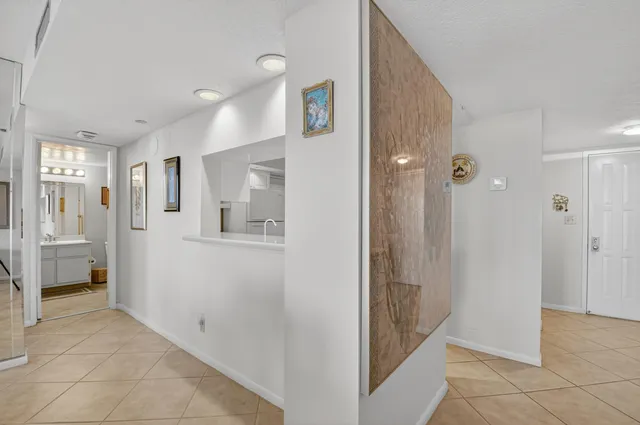 a very nice looking dining room with a table and chairs