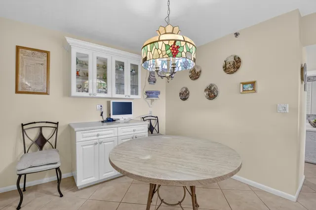 a view of a lake with a house in the background