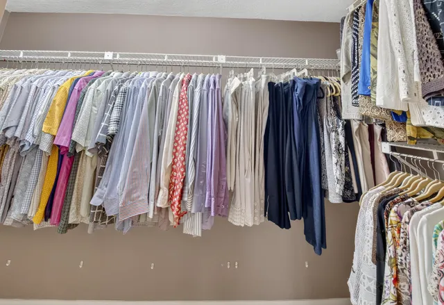 a view of a lake with a houses in the background