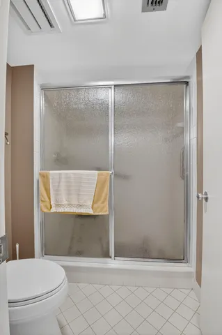 a view of a living room and floor to ceiling window