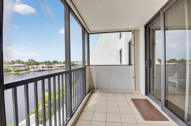 a view of outdoor space with swimming pool and lounge chair
