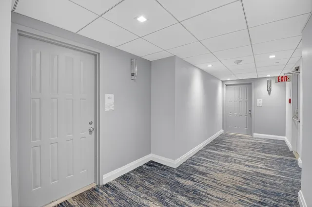 a bed room with a bed and furniture