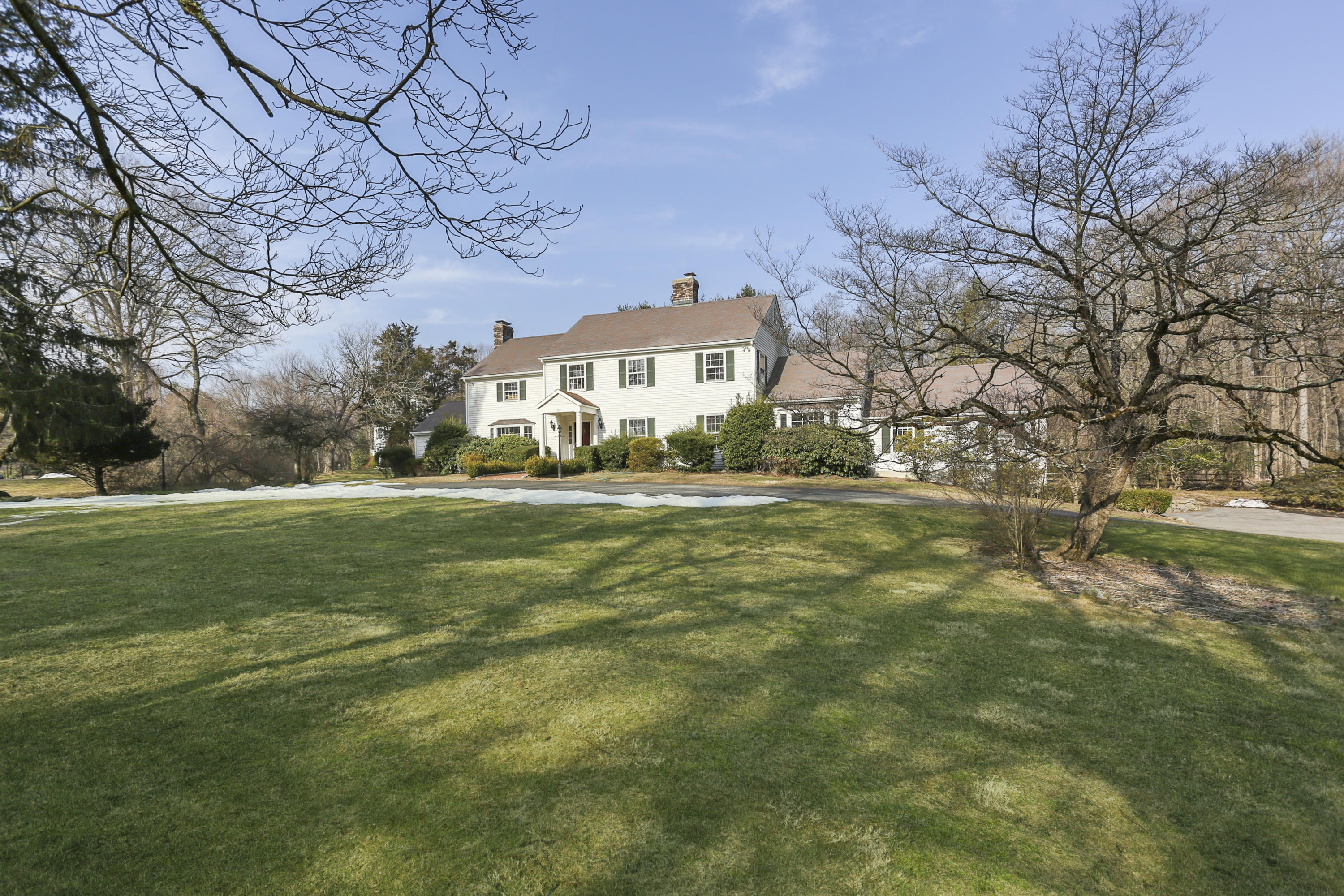 507 Brookside Road New Canaan, CT 06840 - Photo 2 of 36 a view of a house with a big yard