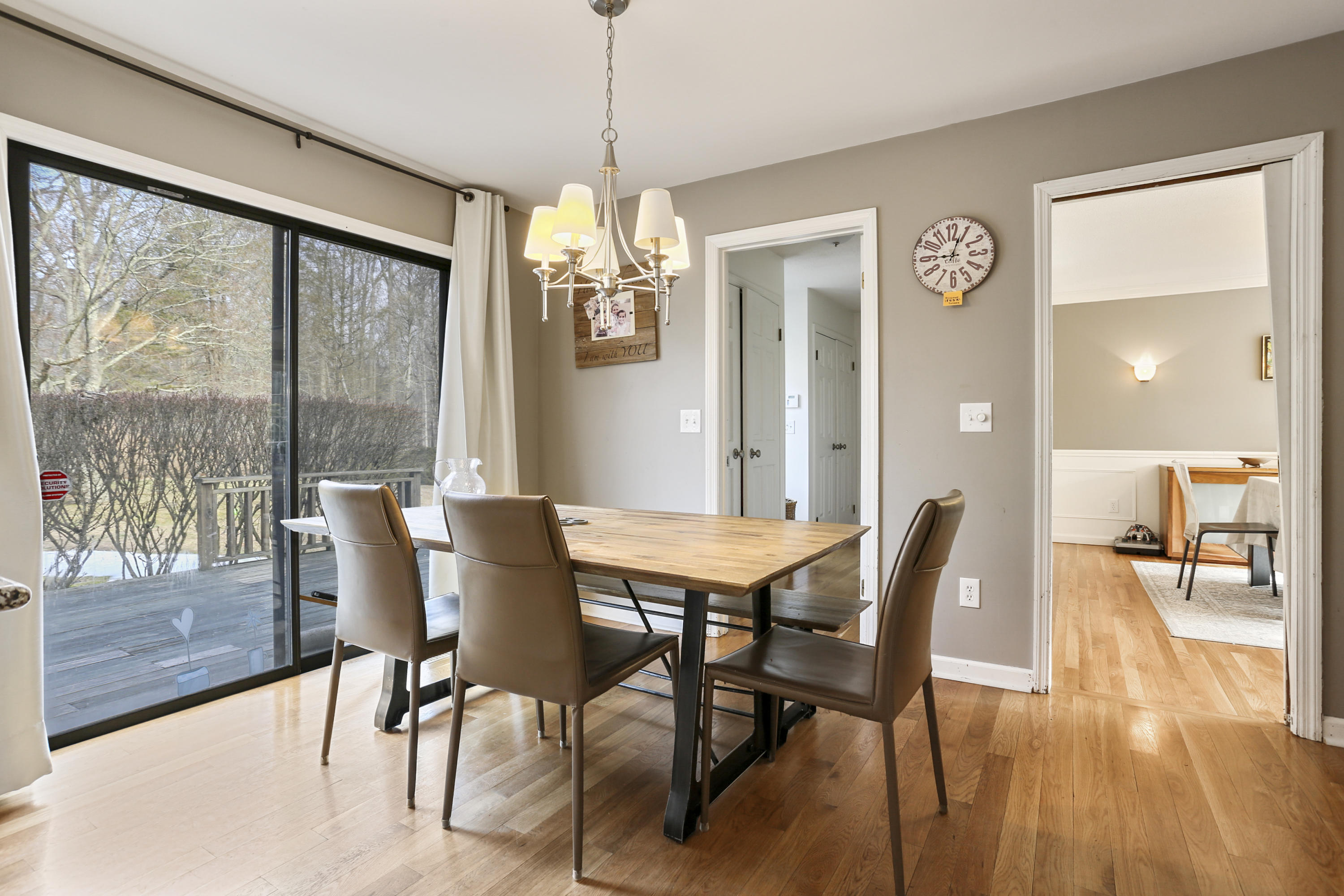 507 Brookside Road New Canaan, CT 06840 - Photo 11 of 36 a view of a dining room with furniture window and wooden floor